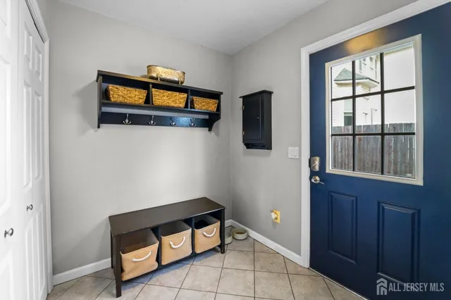 a room with window and a flat screen tv