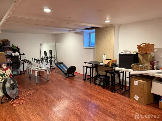 a workspace with furniture and wooden floor