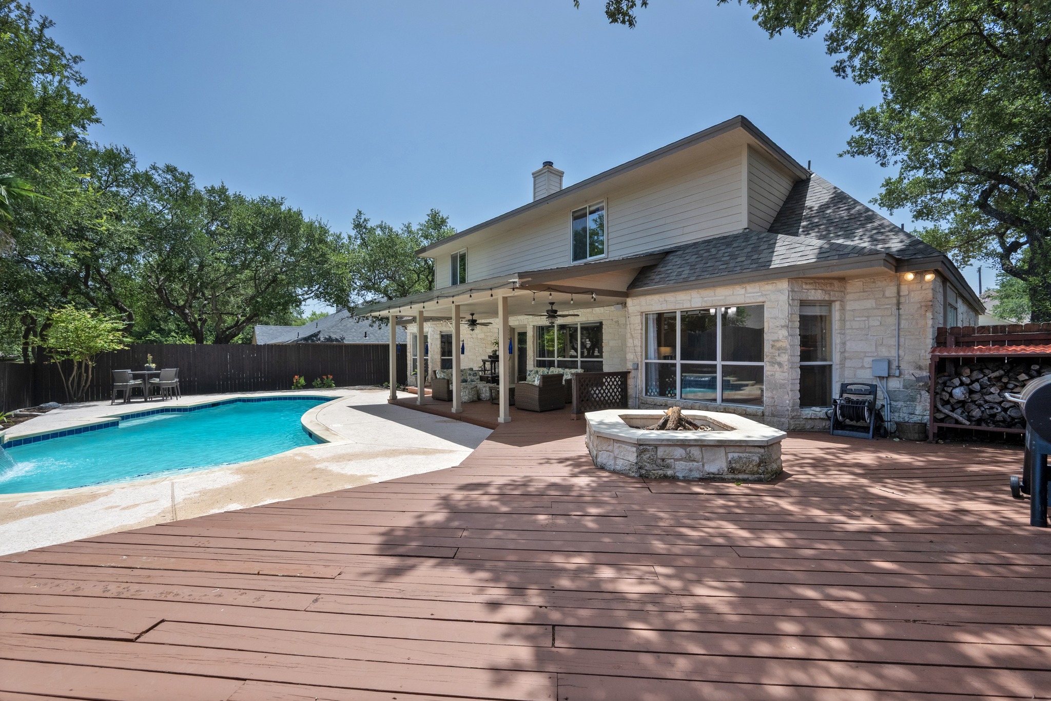 108 Thornwood Road Georgetown, TX 78628 - Photo 39 of 40 An inviting backyard oasis offers a sparkling pool, generous decking, and covered patio for year-round enjoyment.