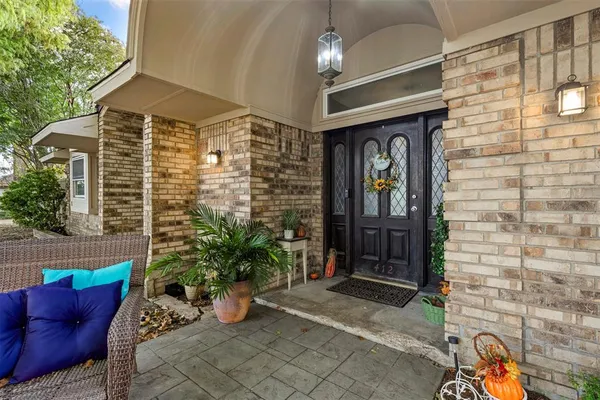 a front view of a house with patio