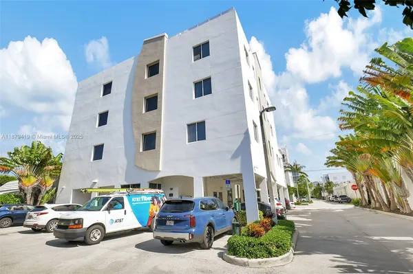 a car parked in front of a building