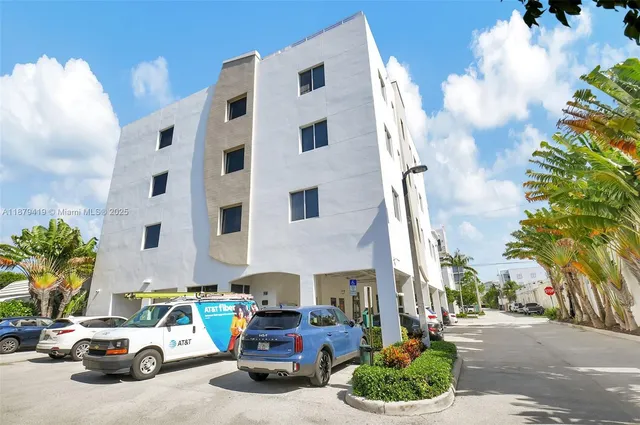 a car parked in front of a building