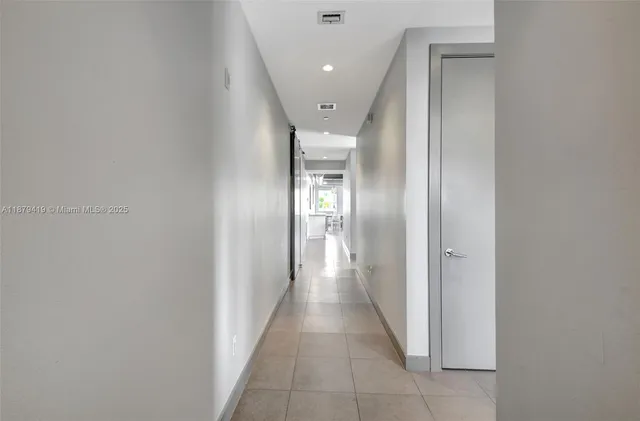 a view of balcony with a potted plant