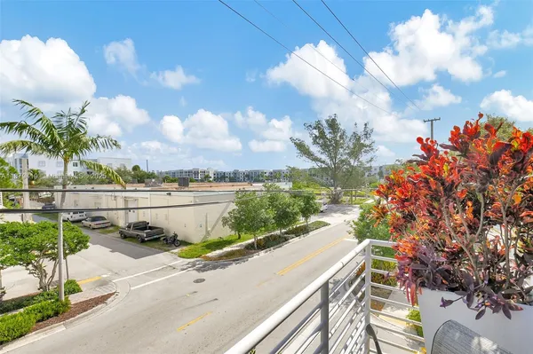 a city street lined with tall buildings
