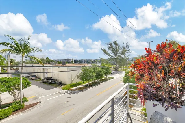 a city street lined with tall buildings