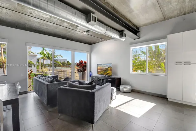 a view of a workspace with furniture