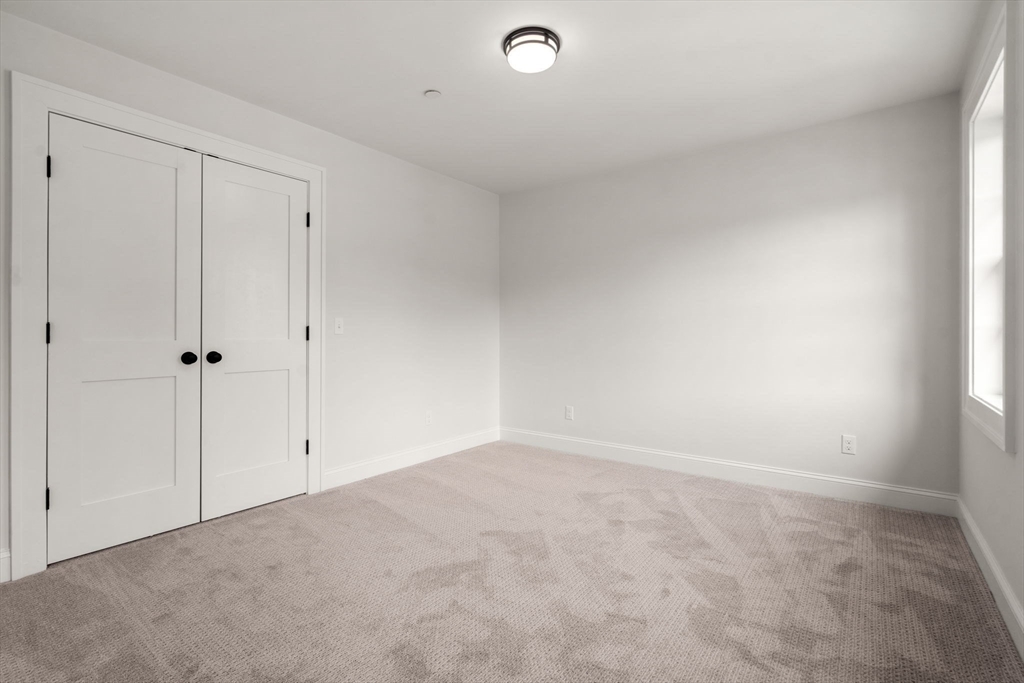 97 Bacon Street, Unit B Natick, MA 01760 - Photo 13 of 37 a view of an empty room