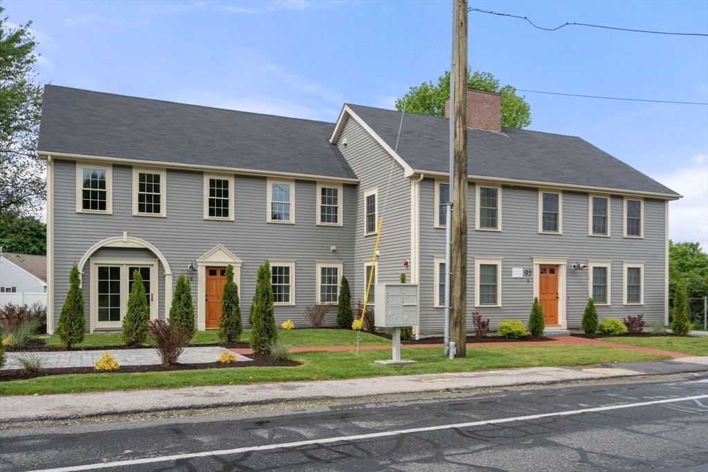 97 Bacon Street, Unit B Natick, MA 01760 - Photo 35 of 37 a front view of a house