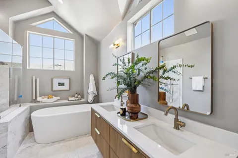 a bathroom with a toilet and shower