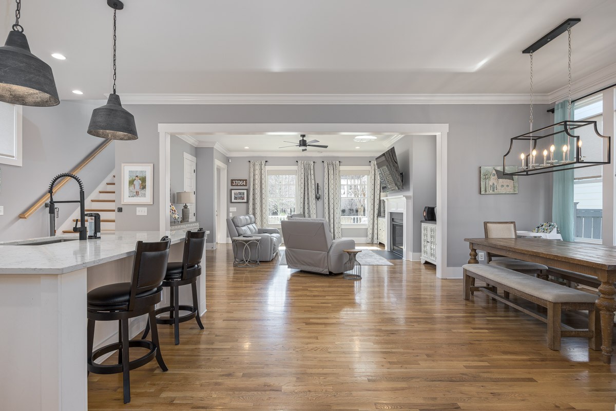 960 Cheltenham Avenue Franklin, TN 37064 - Photo 22 of 62 a view of a dining room and livingroom with furniture wooden floor a chandelier