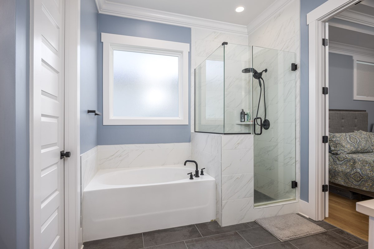 960 Cheltenham Avenue Franklin, TN 37064 - Photo 28 of 62 a bathroom with a bathtub and a shower