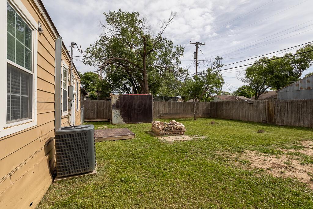 4105 Gables Street Amarillo, TX 79110 - Photo 18 of 18 a fire hydrant in the middle of a yard
