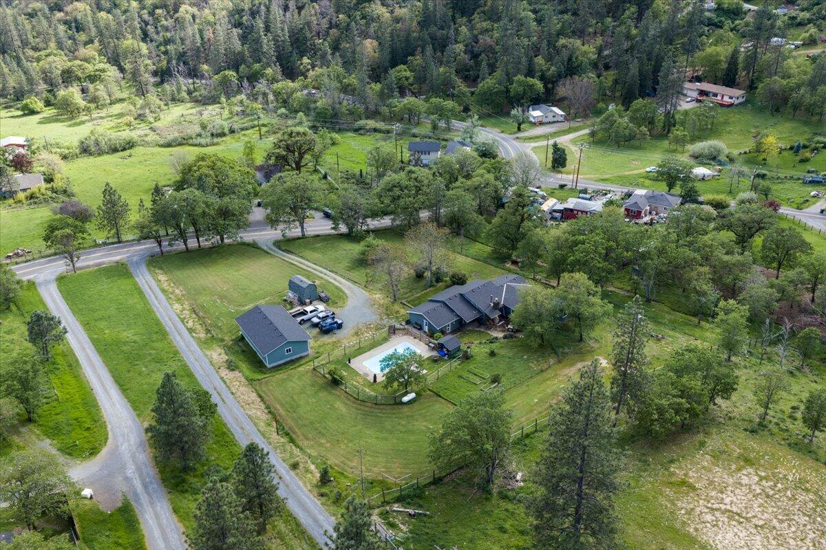 1360 Oxyoke Road Grants Pass, OR 97526 - Photo 5 of 39 an aerial view of a house with pool outdoor seating and yard