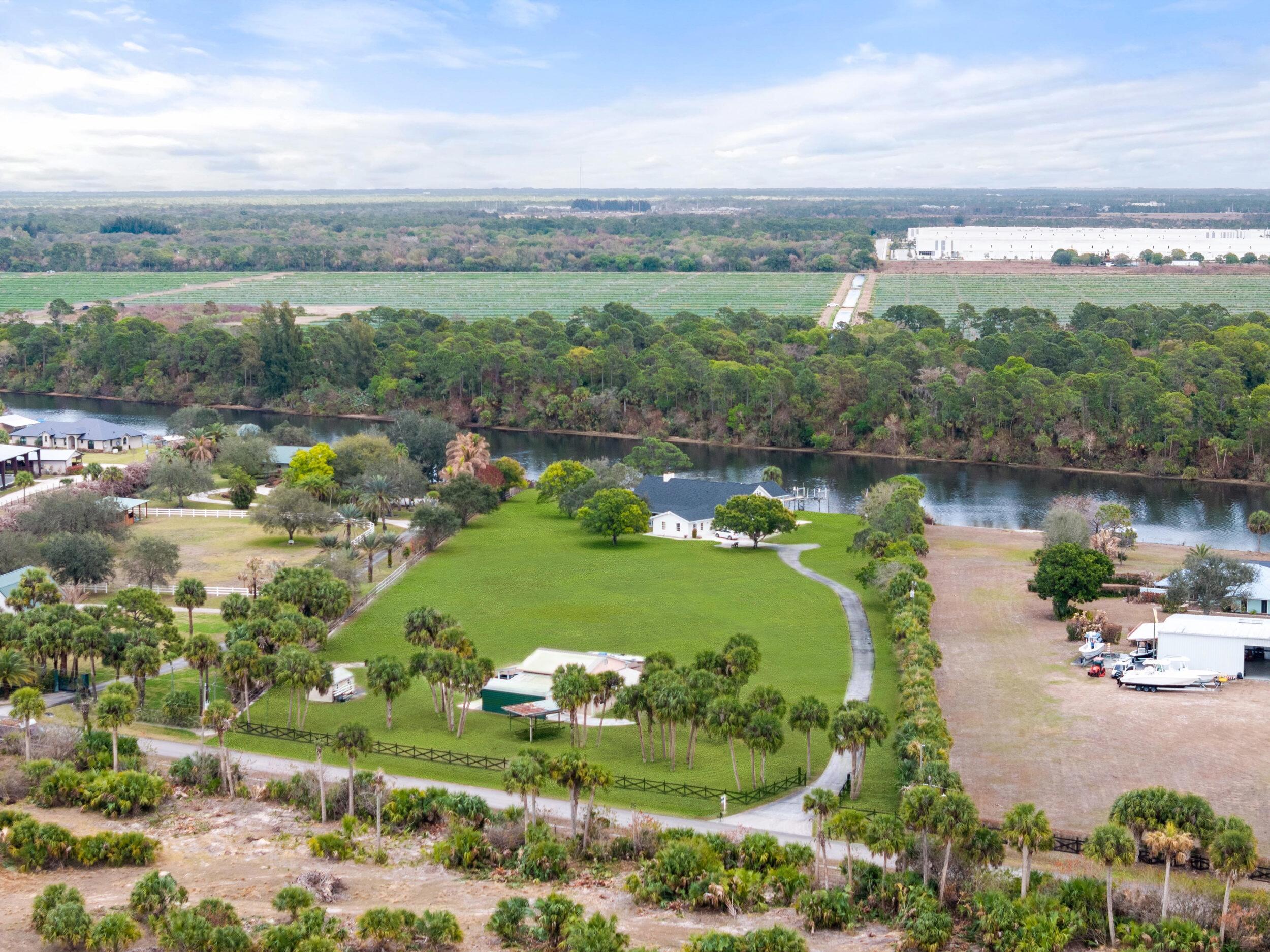 10125 Southwest Green Ridge Lane, Unit LANE Palm City, FL 34990 - Photo 81 of 84 64_dji_20260227035841_0124_d