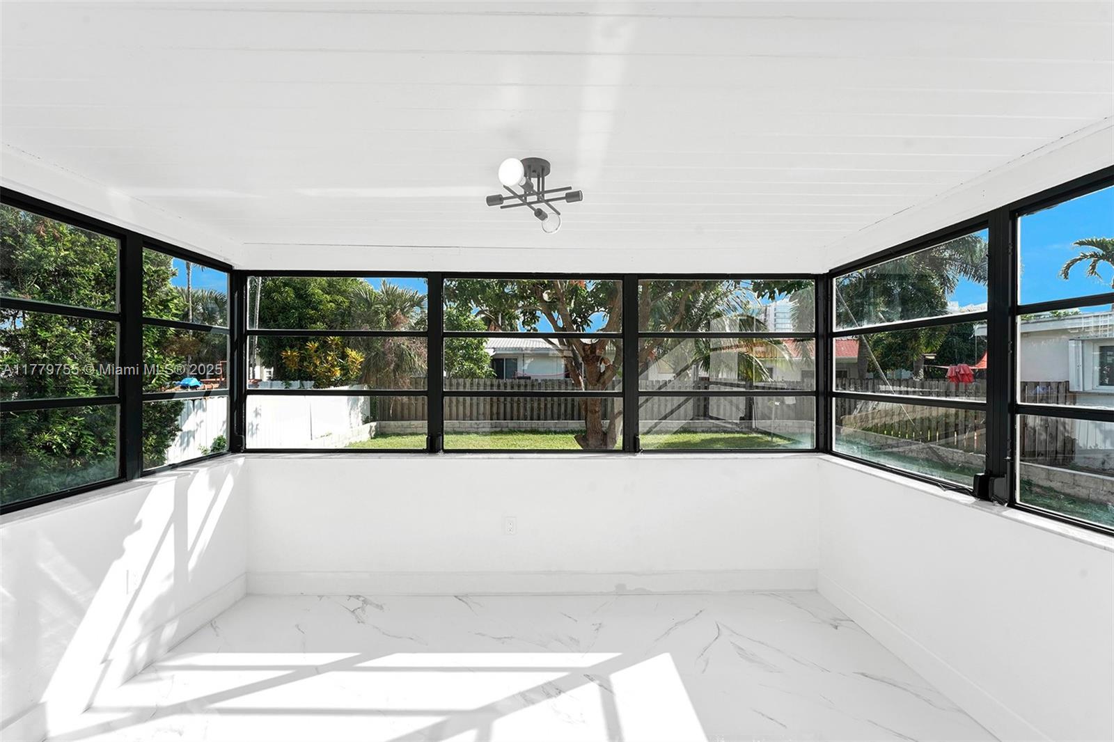 9173 Byron Avenue Surfside, FL 33154 - Photo 17 of 25 a view of swimming pool from a balcony