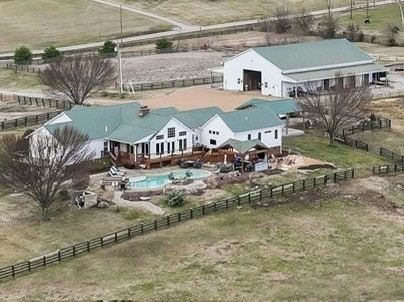 1180 Allisona Road Eagleville, TN 37060 - Photo 1 of 65 an aerial view of a house with a yard