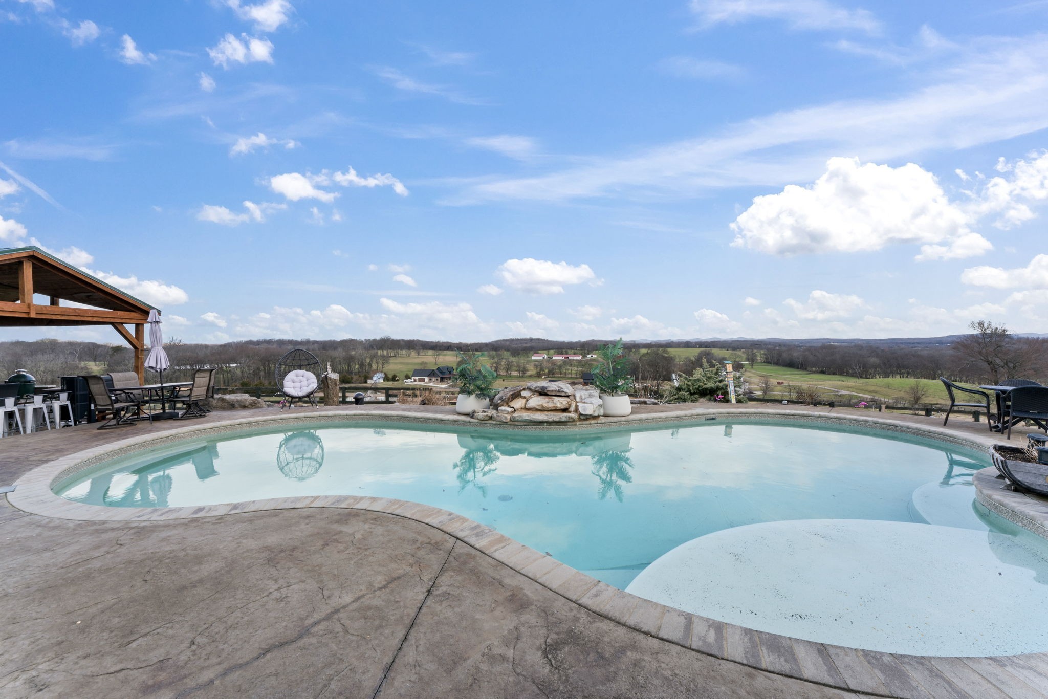 1180 Allisona Road Eagleville, TN 37060 - Photo 14 of 65 a view of a swimming pool and an outdoor seating