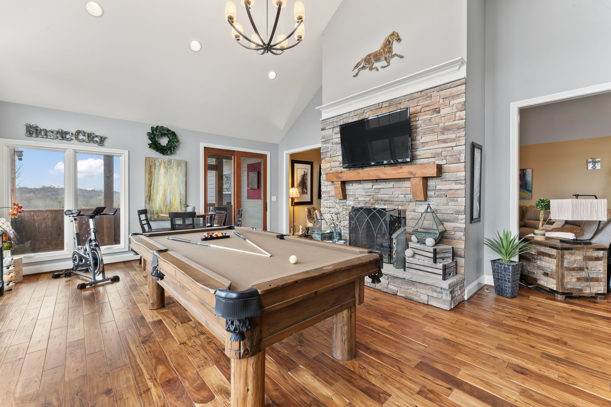 1180 Allisona Road Eagleville, TN 37060 - Photo 20 of 65 a living room with furniture a flat screen tv and a fireplace