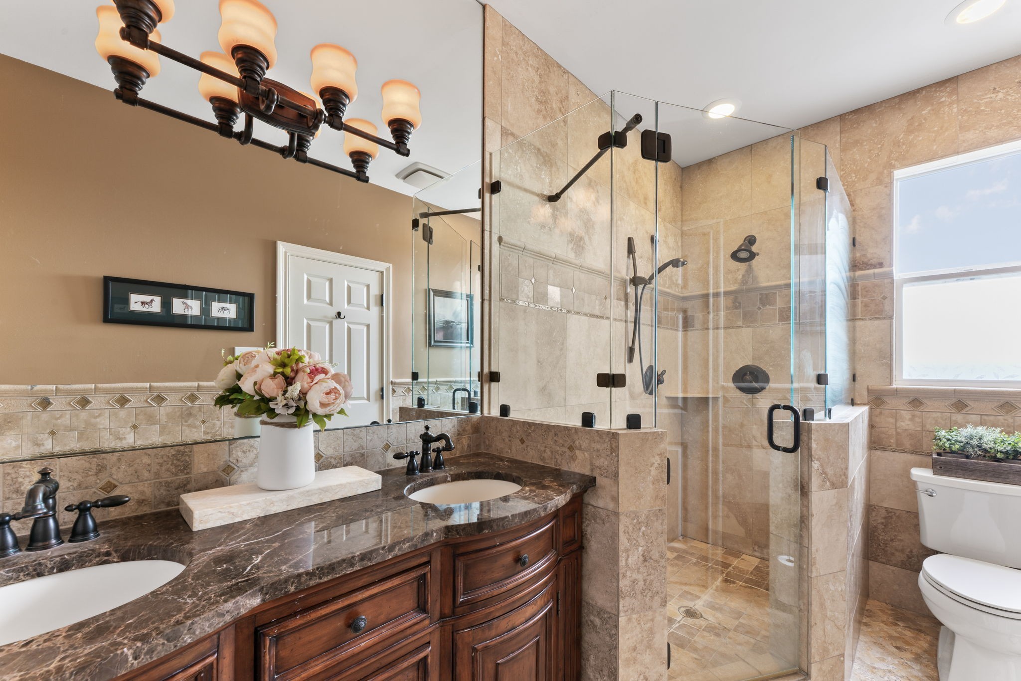 1180 Allisona Road Eagleville, TN 37060 - Photo 36 of 65 a bathroom with a granite countertop sink a mirror a vanity and shower