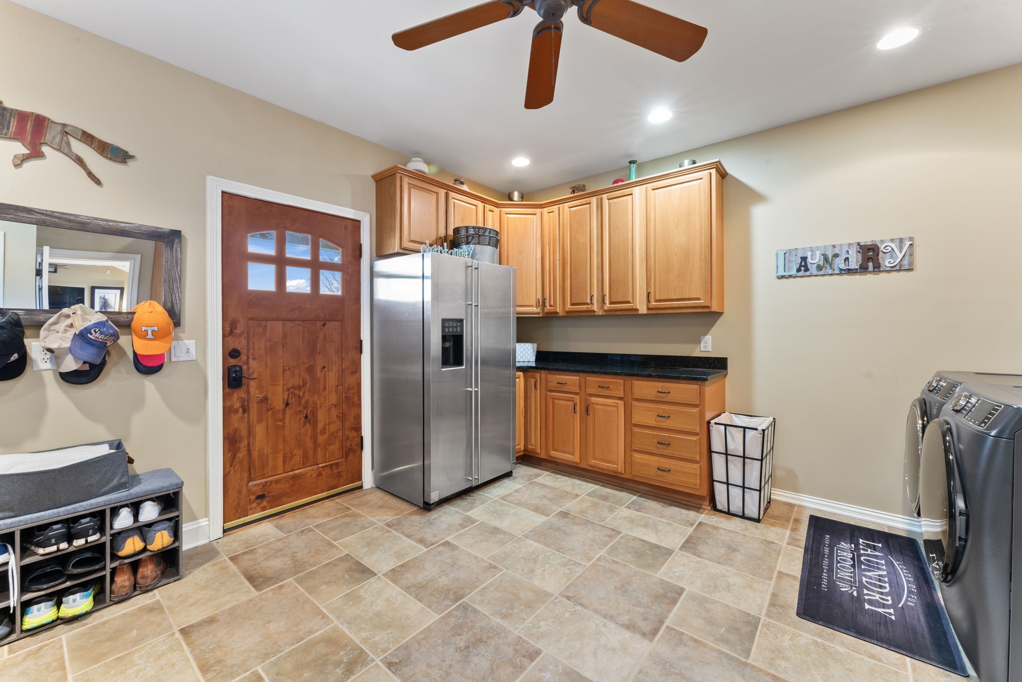 1180 Allisona Road Eagleville, TN 37060 - Photo 44 of 65 a kitchen with stainless steel appliances granite countertop a refrigerator and a sink