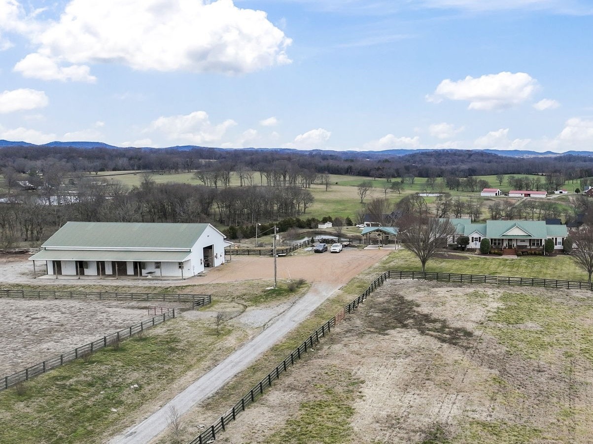 1180 Allisona Road Eagleville, TN 37060 - Photo 50 of 65 a view of a lake with a mountain in the background
