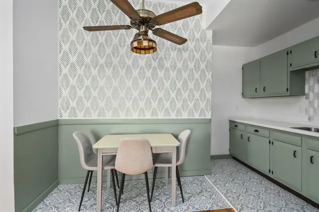 a view of a dining room with furniture