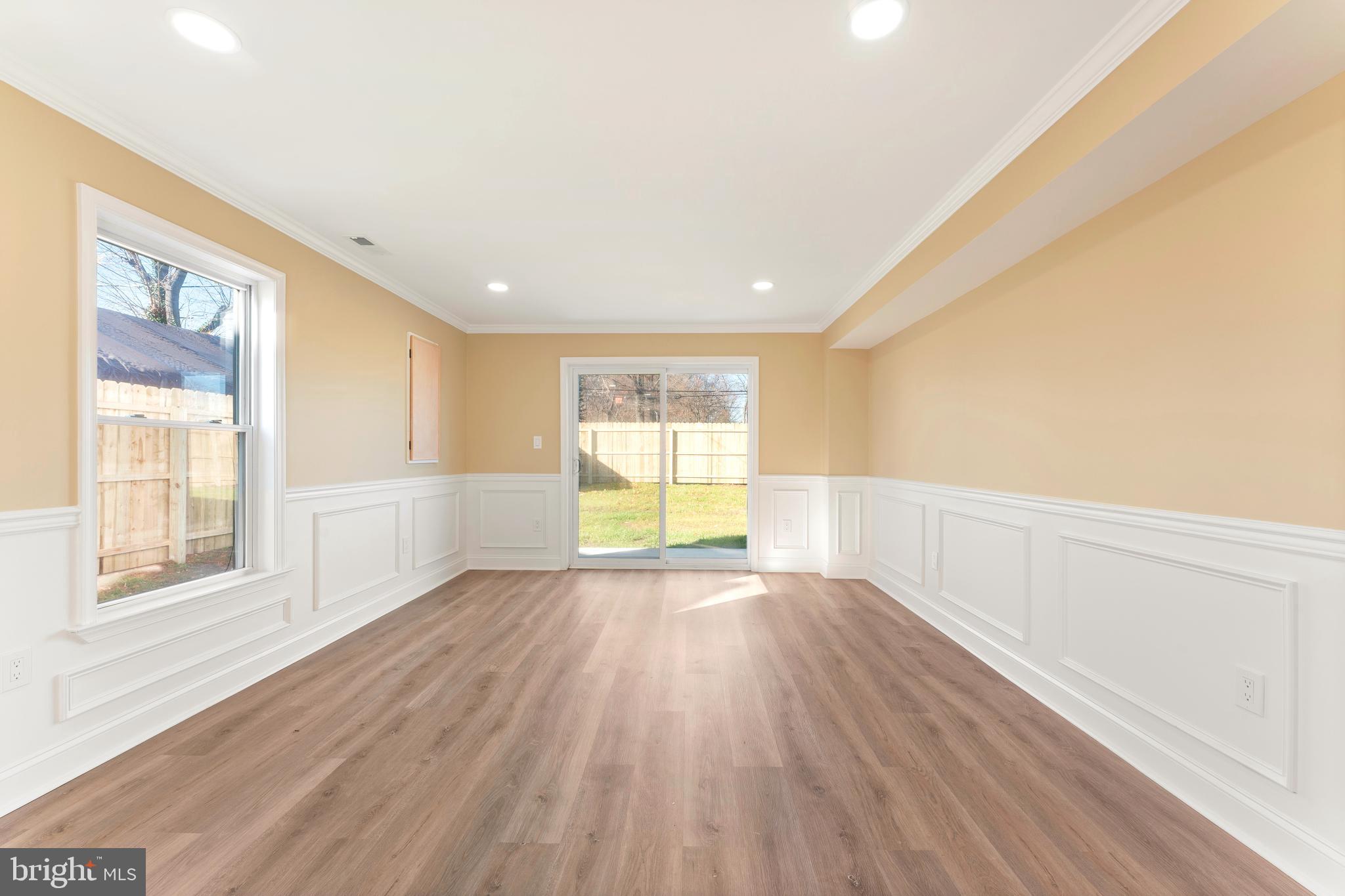 43 Petunia Road Levittown, PA 19056 - Photo 15 of 35 a view of an empty room with wooden floor and a window