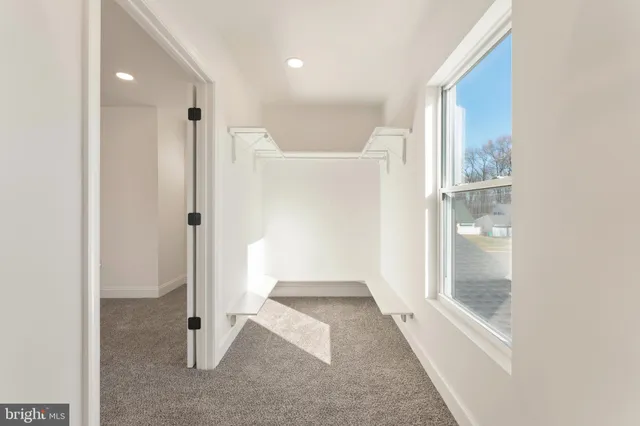 a view of entryway with white walls