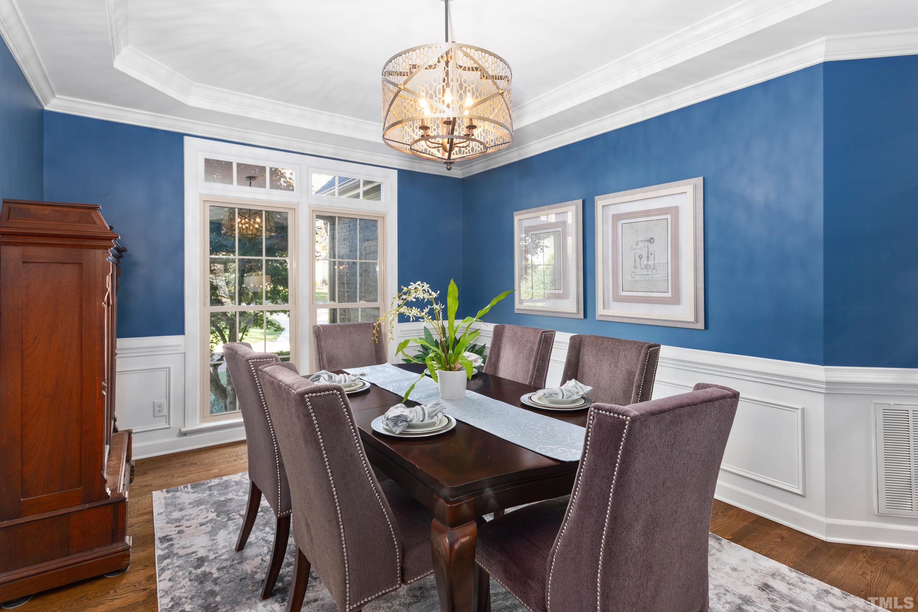 114 Old Pros Way Cary, NC 27513 - Photo 17 of 26 a view of a dining room with furniture window and wooden floor