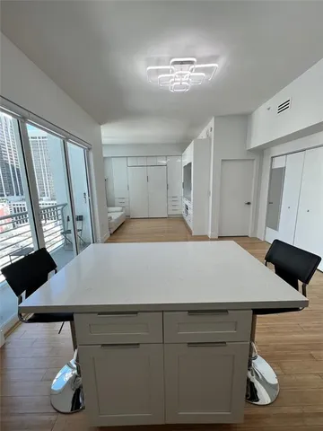 a room with a bed furniture and a window