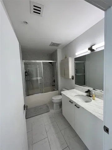a view of a bathroom with a sink and a toilet
