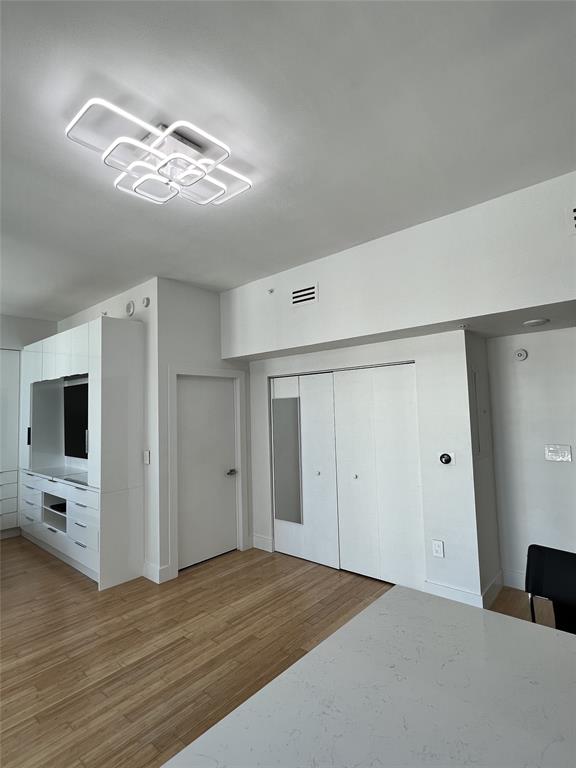 133 Northeast 2nd Avenue, Unit 1610 Miami, FL 33132 - Photo 19 of 52 a view of a livingroom with an empty space