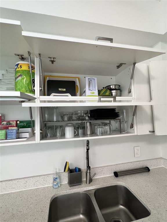 133 Northeast 2nd Avenue, Unit 1610 Miami, FL 33132 - Photo 26 of 52 a kitchen with a oven and cabinets