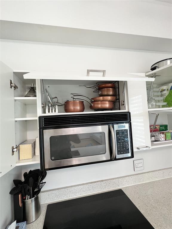 133 Northeast 2nd Avenue, Unit 1610 Miami, FL 33132 - Photo 27 of 52 a utility room with dryer and washer