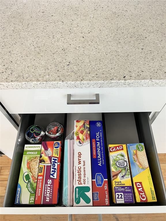 133 Northeast 2nd Avenue, Unit 1610 Miami, FL 33132 - Photo 34 of 52 a picture of a book and a bed