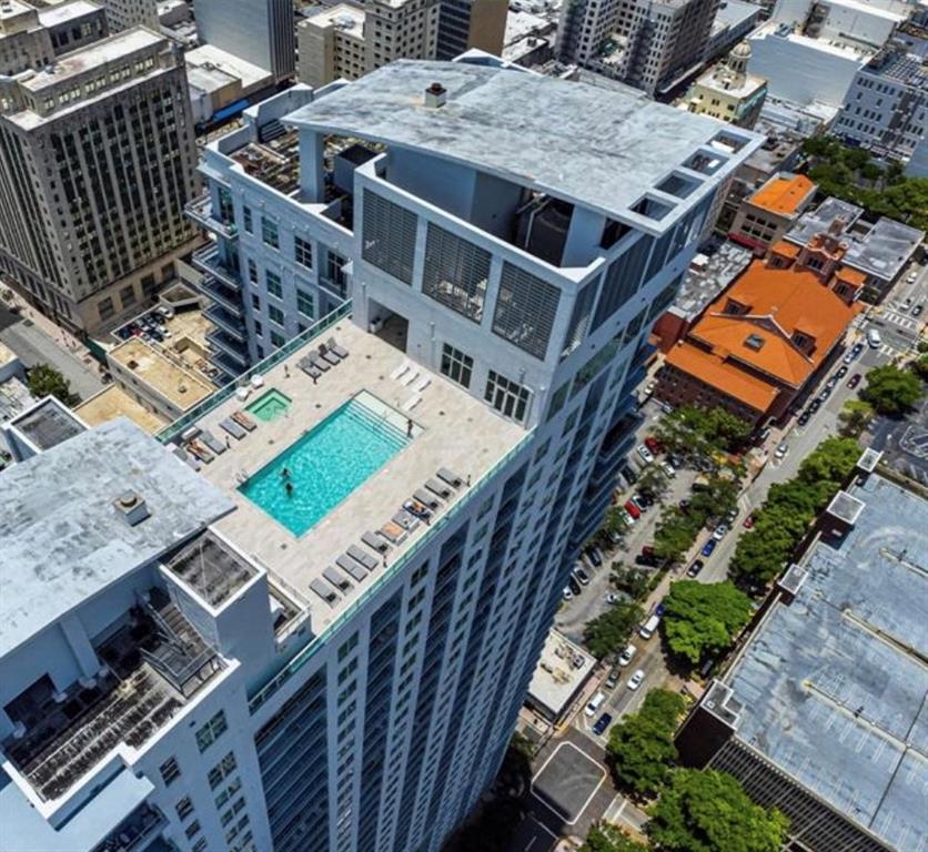 133 Northeast 2nd Avenue, Unit 1610 Miami, FL 33132 - Photo 41 of 52 an aerial view of a house with a roof deck