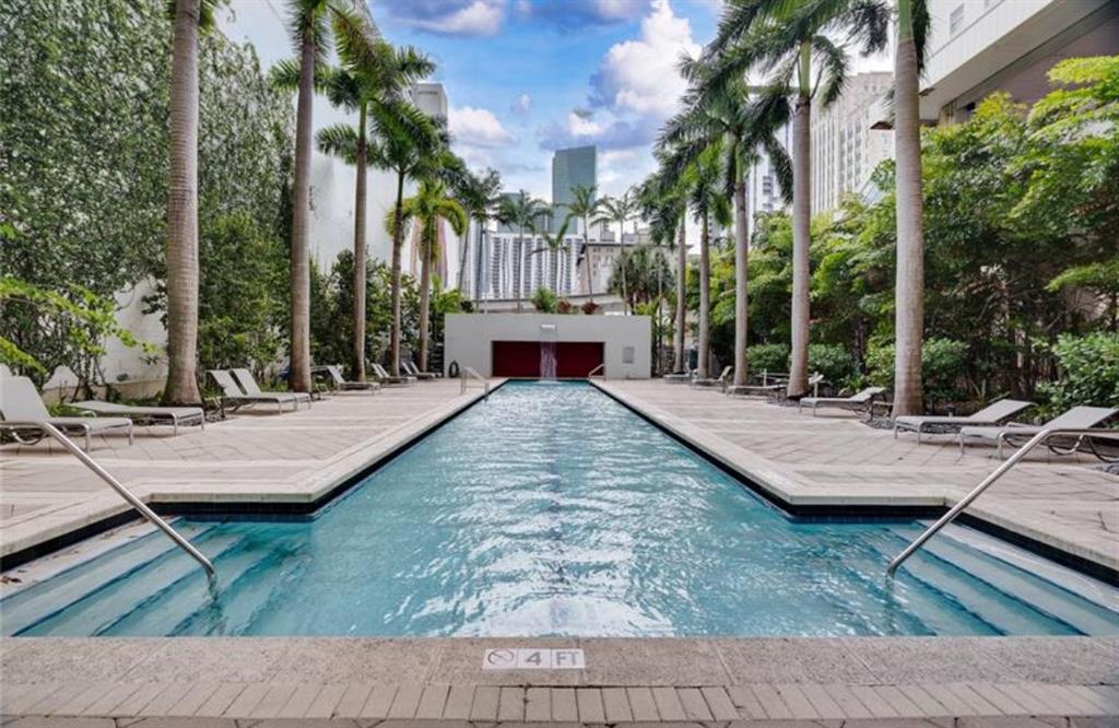 133 Northeast 2nd Avenue, Unit 1610 Miami, FL 33132 - Photo 48 of 52 a view of house with yard and swimming pool