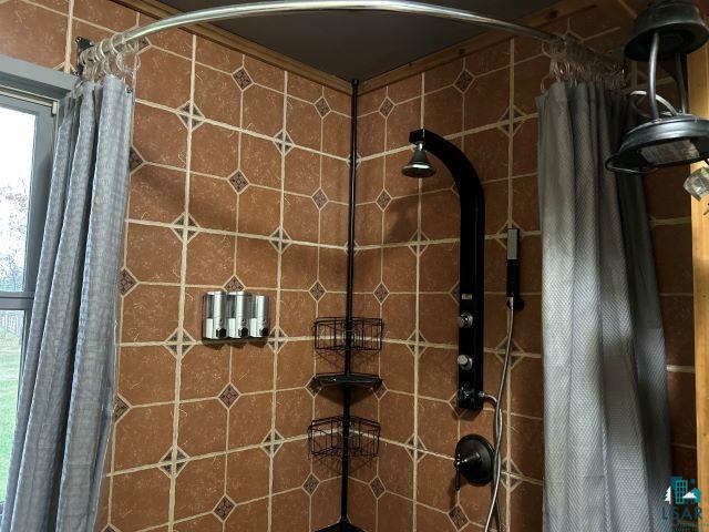 8353 Mannik Road Iron River, WI 54847 - Photo 43 of 52 Bathroom view of a tile shower