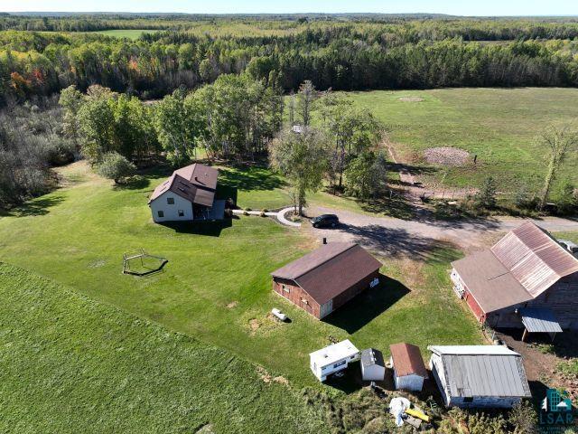 8353 Mannik Road Iron River, WI 54847 - Photo 5 of 52 Aerial view of a heavily wooded area