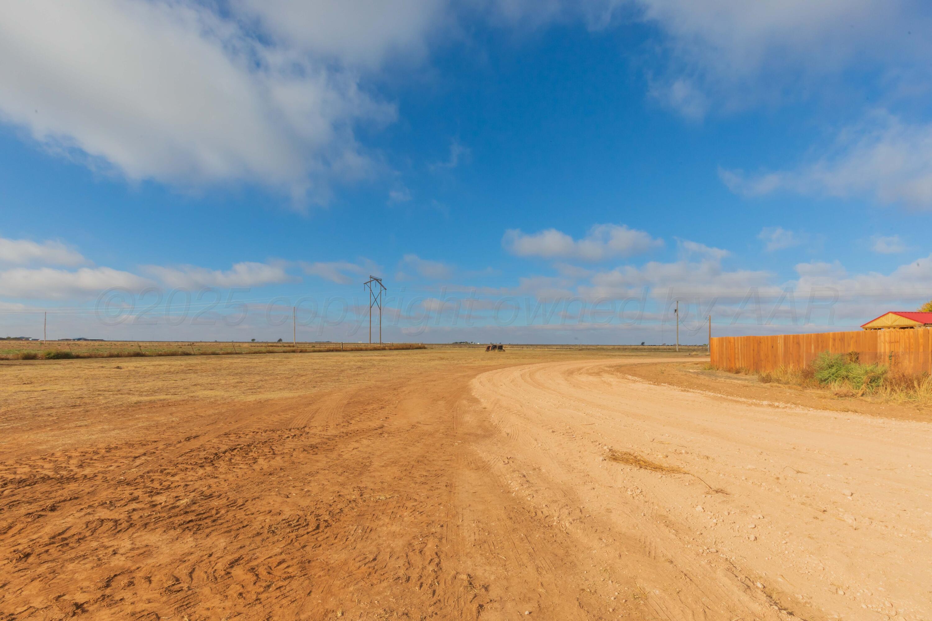 22701 South Blessen Road Canyon, TX 79015 - Photo 28 of 32 a view of an ocean and beach