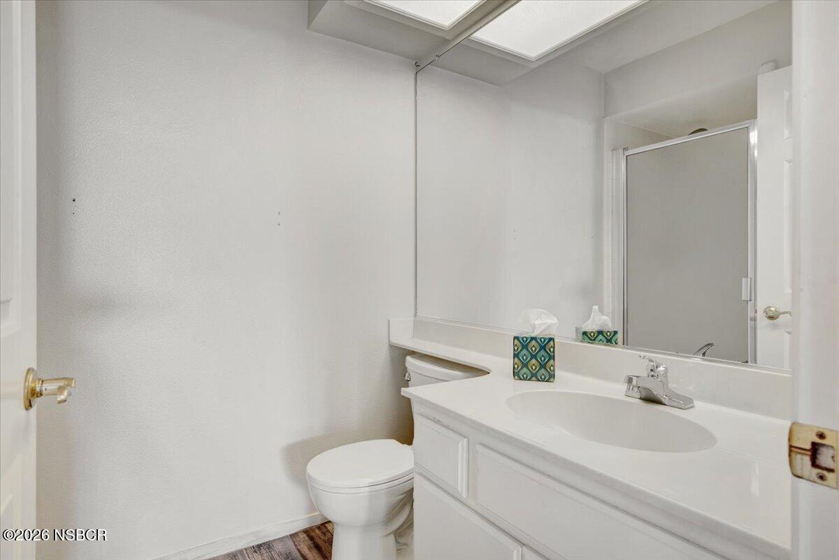 1248 Stonebrook Drive Lompoc, CA 93436 - Photo 17 of 38 a bathroom with a sink and a toilet