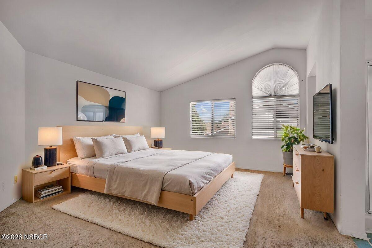 1248 Stonebrook Drive Lompoc, CA 93436 - Photo 22 of 38 a bedroom with a bed and a painting on the wall