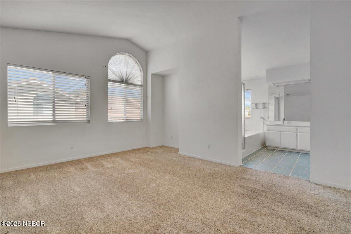 1248 Stonebrook Drive Lompoc, CA 93436 - Photo 23 of 38 a view of an empty room with a window