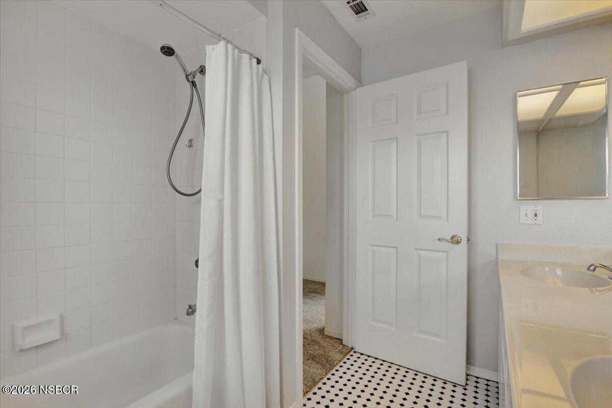 1248 Stonebrook Drive Lompoc, CA 93436 - Photo 28 of 38 a bathroom with a shower