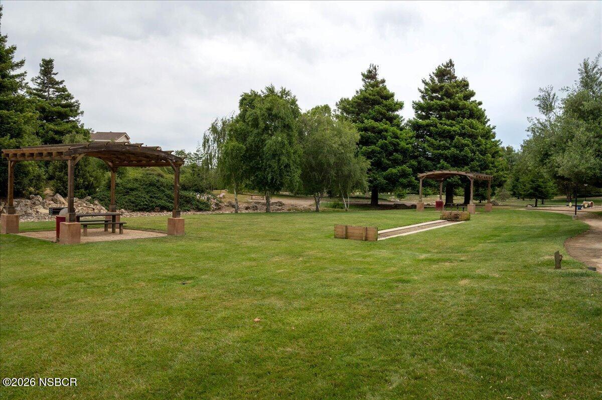 1248 Stonebrook Drive Lompoc, CA 93436 - Photo 36 of 38 a view of a park with swings and slides