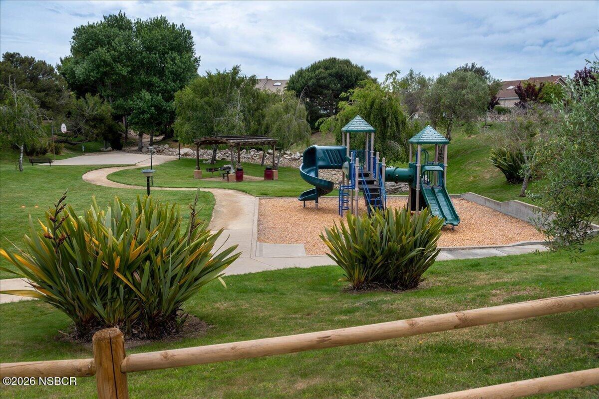1248 Stonebrook Drive Lompoc, CA 93436 - Photo 38 of 38 a view of a table and chairs in the garden