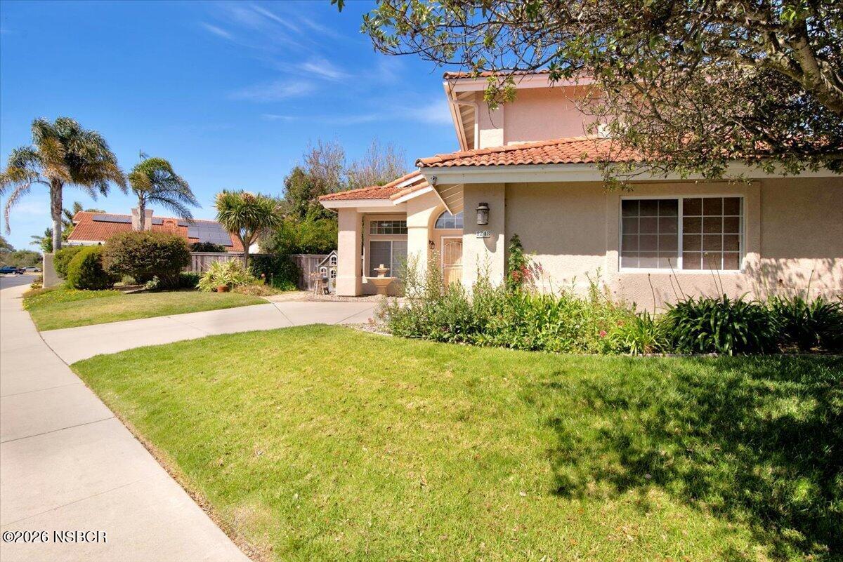1248 Stonebrook Drive Lompoc, CA 93436 - Photo 4 of 38 a view of a house with a yard