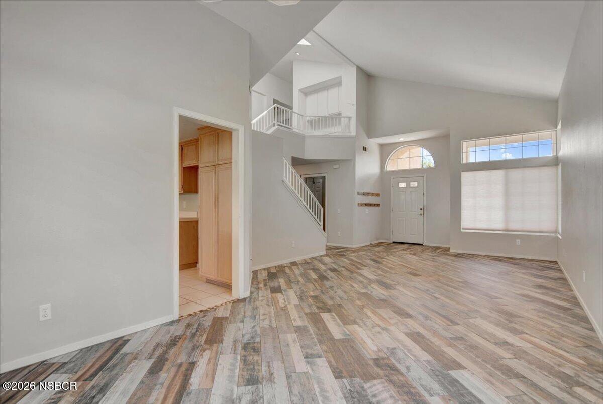 1248 Stonebrook Drive Lompoc, CA 93436 - Photo 5 of 38 a view of empty room with wooden floor