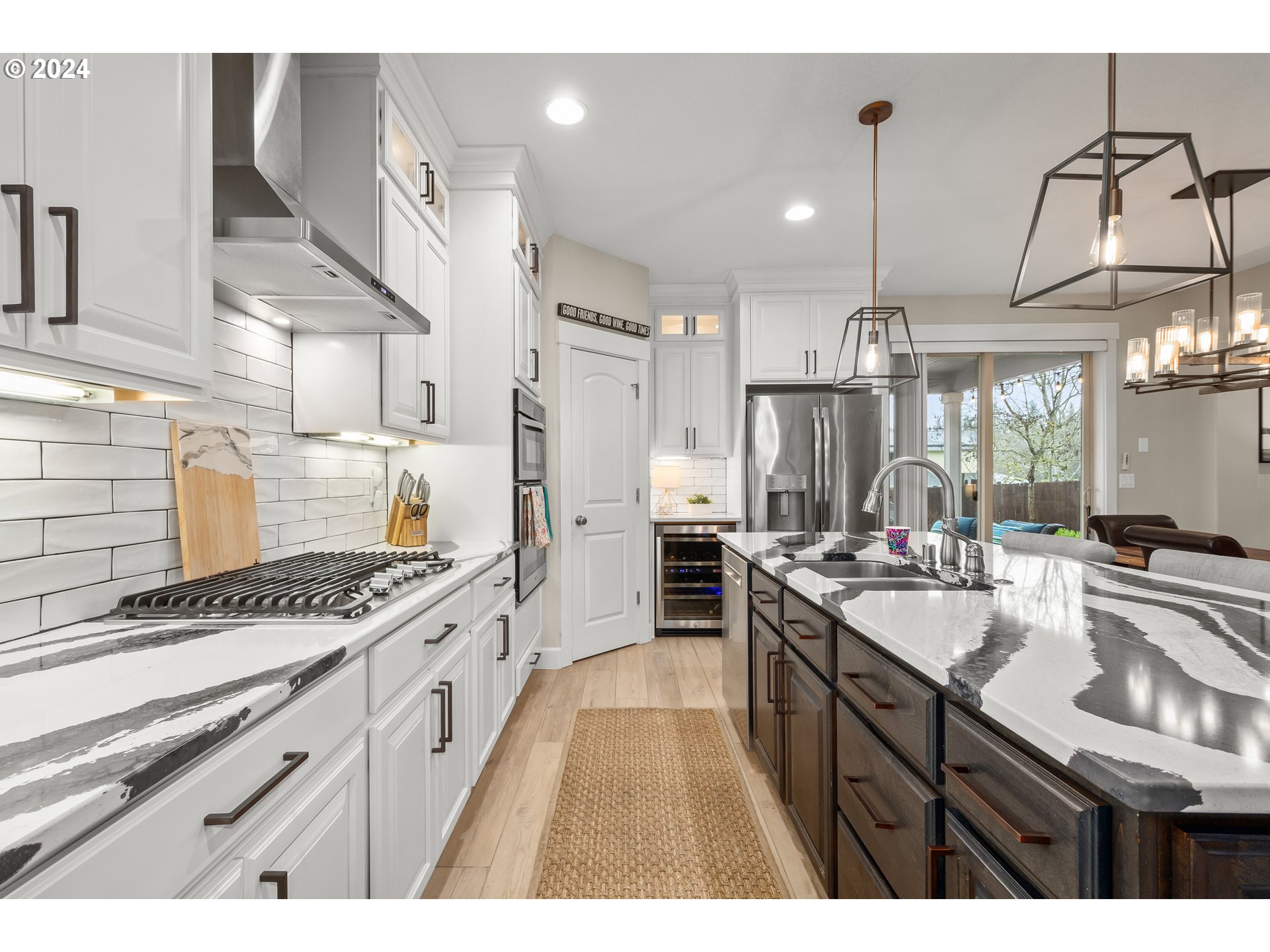 2804 Northeast 167th Circle Ridgefield, WA 98642 - Photo 12 of 36 a kitchen with sink stove and cabinets