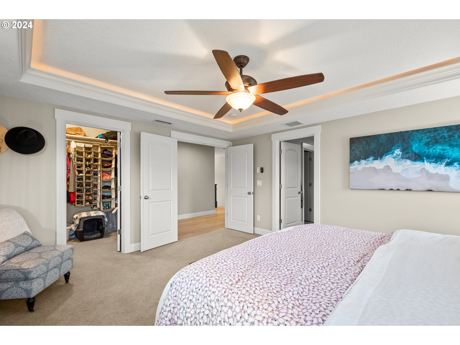 2804 Northeast 167th Circle Ridgefield, WA 98642 - Photo 18 of 36 a bedroom with a bed and a painting on the wall